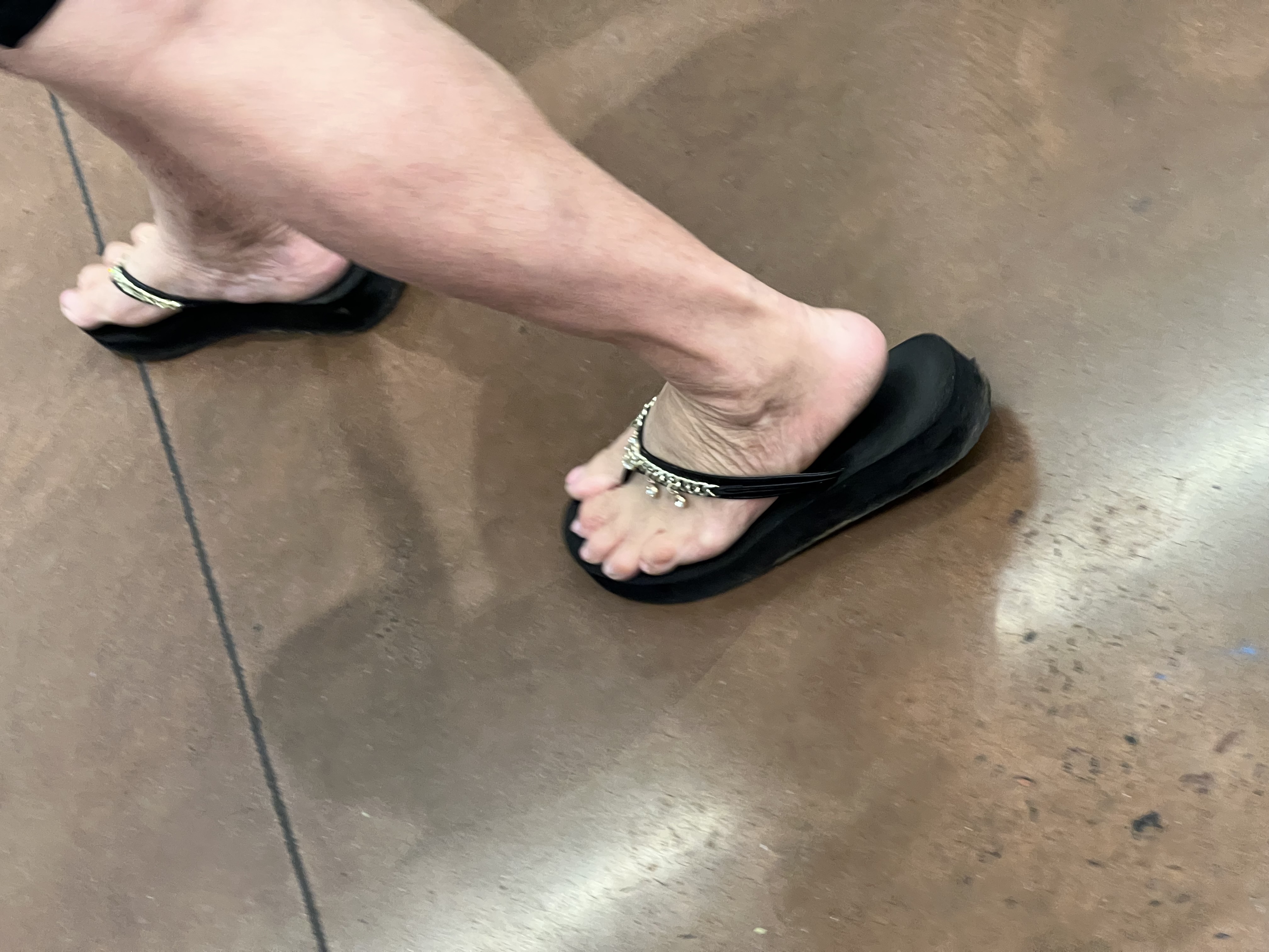 Gilf and milf feet at supermarket — 17